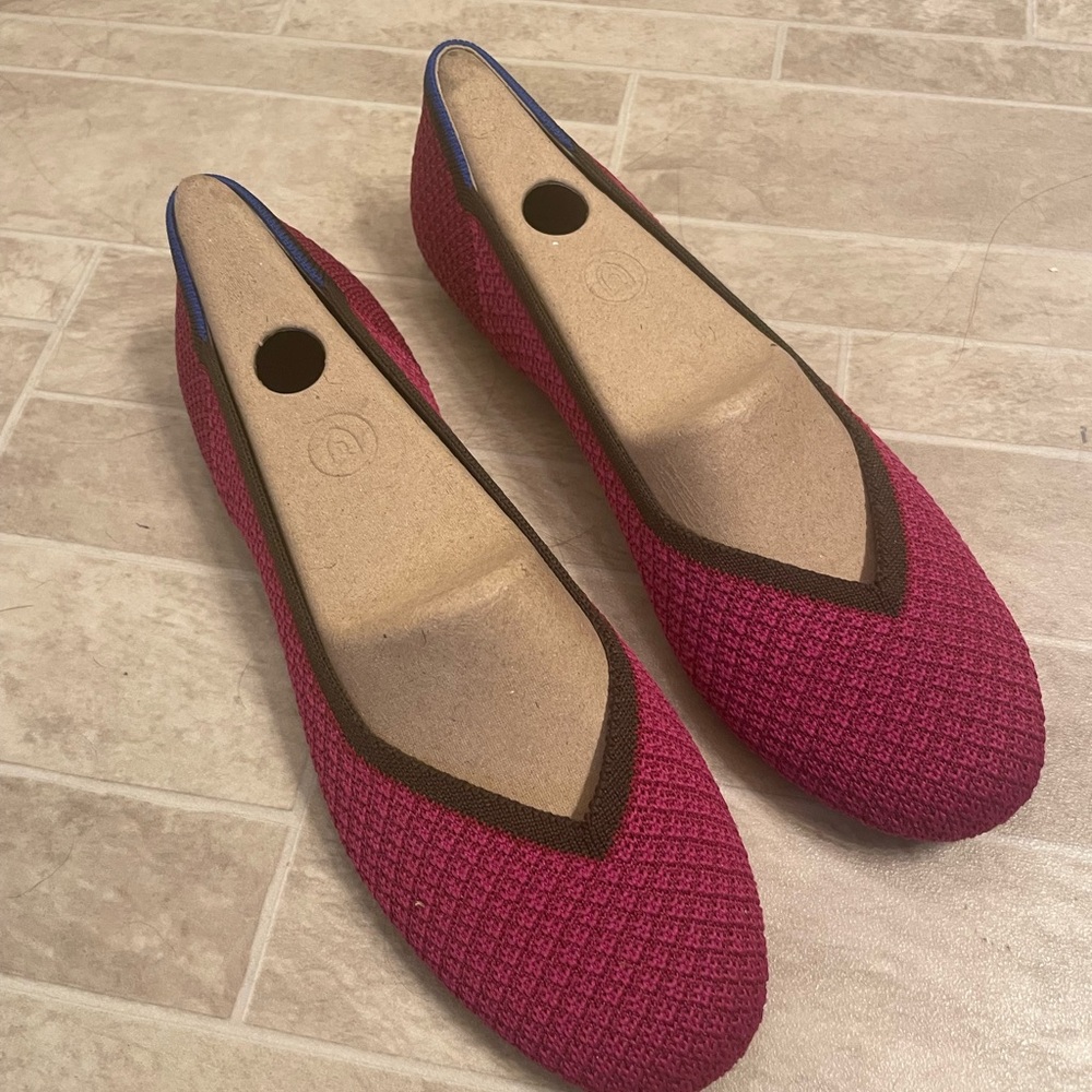 Rothy’s dark pink flats worn once. Size 8.5.